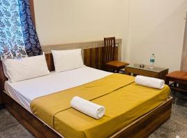 Embassy Grand boarding and lodging，位于Nelamangala的酒店