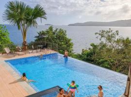 Guisian Cove Resort，位于Payo的带停车场的酒店