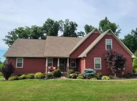 The Red House on the Mountain Top