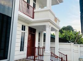 Triple s homes，位于阿鲁沙的带热水浴缸的酒店