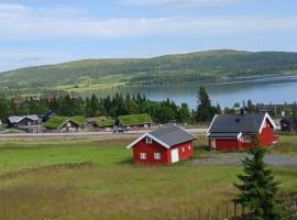 Leilighet med panoramautsikt Sjusjøen Innendørs parkering，位于斯朱森的酒店