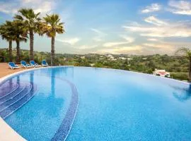 Modern apartment with in-&outside pool, sauna&gym, heating, rooftop terrace with amazing sea&mountains view