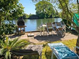 Appartement familial avec jardin et vue sur lac à Clairac, 80 m²，位于Clairac的酒店