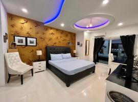 Sheryll Escapes - Kandi Palace Grand 2 BR! Housekeeping, Internet!，位于安吉利斯的公寓