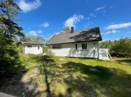 Fin landlig hytte med utsikt