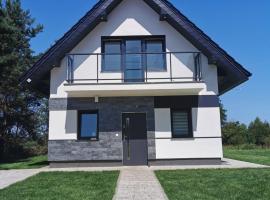 Łasko - Wildlife Phototherapy - 4 luksusowe, klimatyzowane wille, z dostępem do oddalonego o 5 min spacerem prywatnego terenu rekreacyjnego，位于Bierzwnik的酒店