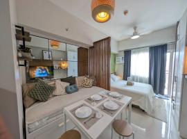 RufiRemy Cozy Hideaway PrimeWorld District Condo，位于Lapu Lapu City的酒店