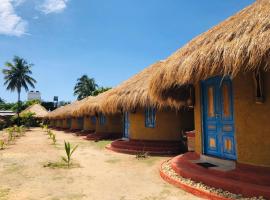 Rustic Cabanas & Restaurant，位于阿鲁甘湾的酒店