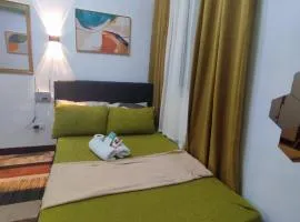 Happy Homestay at Fullerton Suites Condo near Nuvali and Tagaytay