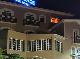 Luso Village Boutique Hotel，位于卢索的酒店