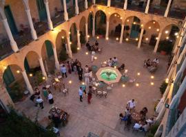 Deir Al Oumara，位于代埃尔卡马尔的酒店