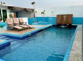 Private Rooms in Shared Beach Chalet - 1，位于阿尔哈德的酒店