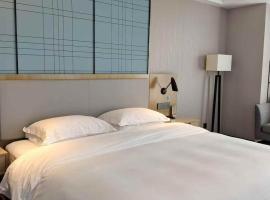 宜尚酒店十堰汉江师范学院店，位于Shiyanjie的酒店