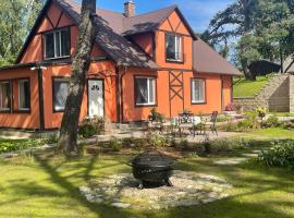 More Holiday Cottage M, 85 meters to the beach with large garden，位于Bigauņciems的别墅