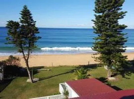 Direct Beachfront Sunrise Apartment - The Coachhouse