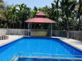 Nisarg farm house beach resort Kashid，位于卡希德的酒店
