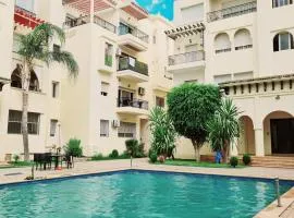 Fes Urban Apartment - Urban Elegance with Garden and Pool Access