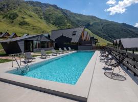Kazbegi Targmani Cottages，位于卡兹贝吉的酒店