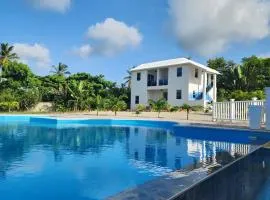 Bella Villa room with large pool and close to beach