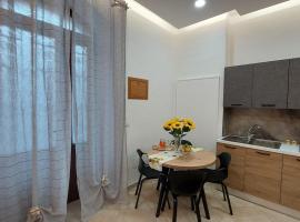 Appartamento Il Girasole，位于陶尔米纳的海滩酒店