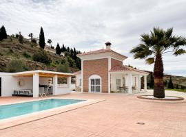 Luxury villa - breathtaking views - hot tub - 15' to beach，位于孔佩塔的酒店