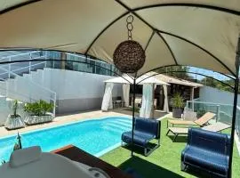 Casa com piscina área gourmet Enseada Azul