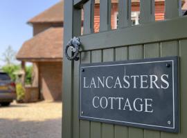 Lancasters Cottage，位于霍舍姆的酒店