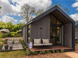 Luxe Tinyhouse Salie op klein vakantiepark，位于米尔森的酒店