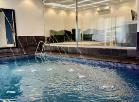 شاليه هاندا Handa Chalet，位于As Sayl aş Şaghīr的酒店