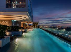 罗勇市中心假日套房酒店，位于罗勇的酒店