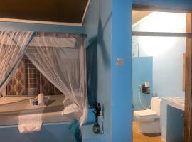 Afro Rooms Tents Beach & Whale Shark safari，位于基林多尼的酒店