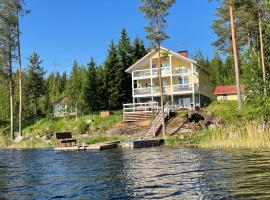 Villa Rantakallio with jacuzzi，位于Melkoniemi的酒店