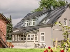 Landhaus hinter`m See Ferienwohnung Landliebe luxuriöser Wintergarten Kachelöfen
