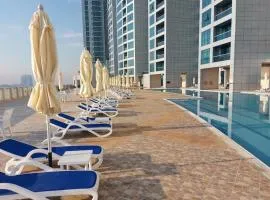 Luxury Corniche Residence 2 BHK pool gym wifi sea front