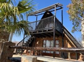 Tonquani Bush Chalet，位于勒斯滕堡的酒店