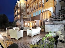 多尔齐维塔小木屋精品酒店，位于摩德纳迪-坎皮格里奥的酒店