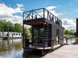 Tiny-Hausboot LIKEDEELER mit Dachterasse und Kamin，位于汉堡的船屋