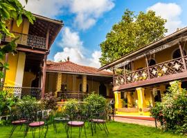 Casa Menezes - A Heritage Goan Homestay，位于巴姆博利姆的宠物友好酒店