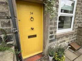 The Yellow Door to The Peaks