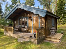 Timrad stuga i kanten av skogen med SPA möjlighet，位于穆尔舍的Spa酒店