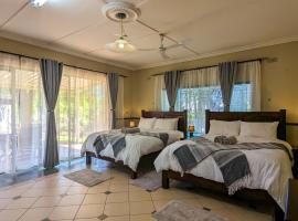 Room in Villa - Zambezi Family Lodge - Elephant Room，位于维多利亚瀑布的酒店