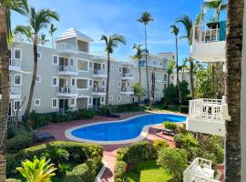 SOL CARIBE SUITES - PLAYA LOS CORALES - beach club, wifi, swimming pool，位于蓬塔卡纳的酒店