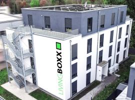 LivingBoxx Karlsruhe - Messe I neuwertiges Gästehaus I Apartments mit Küche，位于赖因斯特滕的胶囊旅馆