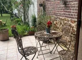 Studio avec terrasse sur jardin