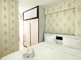 Homey and Comfortable 2BR Grand Sentraland Karawang Apartment By Travelio