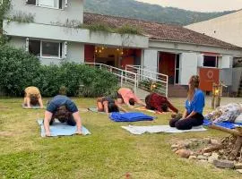 Nômades Vibe da Ilha - Adventure Hostels & Coworking