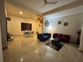 Blissful home near Coimbatore airport，位于哥印拜陀的酒店