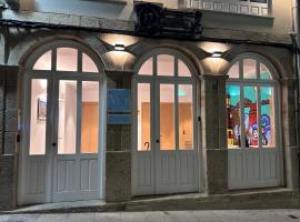 Amando Perez Suites，位于里瓦德奥的酒店