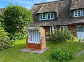 Ferienwohnung im Friesenhaus mit Meerblick，位于诺尔多夫的酒店