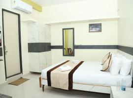M R Residency Belagavi，位于贝尔高姆的酒店